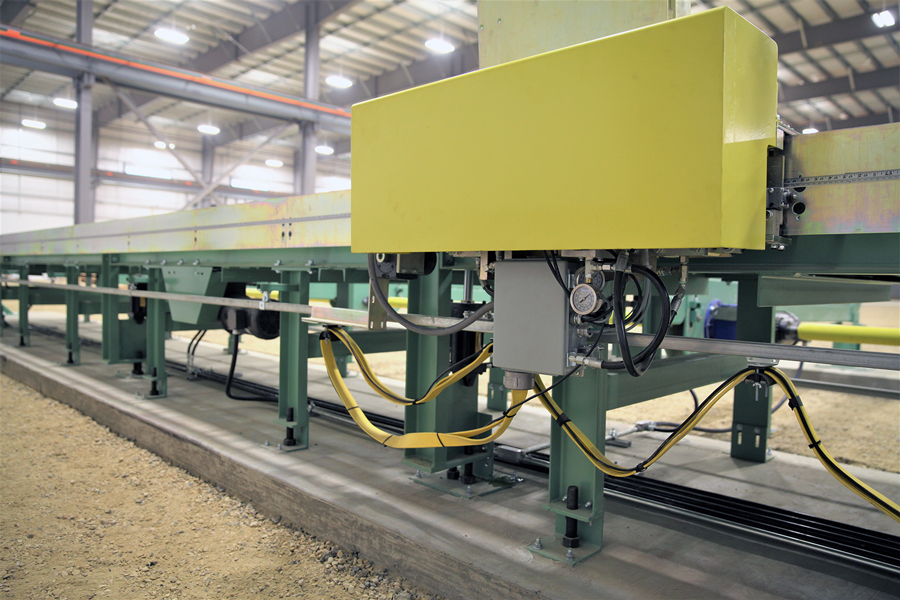 Powered Workstop Measuring System on a structural saw conveyor system for a steel service center.